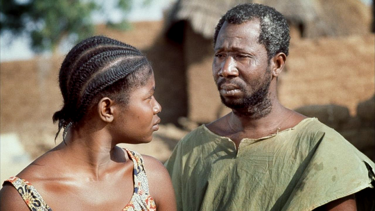 Rasmané Ouédraogo (Saga) in a scene from Tilai and  Ina Cissé (Nogma)